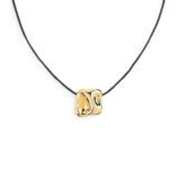 collana-con-cordino-nero-con-pend-a-quad-irr-acciaio-3.jpg